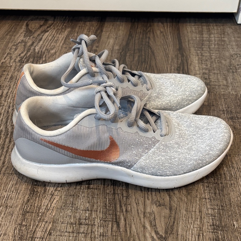 Nike Women's Light Gray Running Sneakers with Copper Swoosh